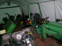 Backhoe fits in 30ft membrane outbuilding for now.JPG