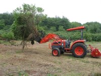 Millonzi 4 ft grapple on DK40se with bush.jpg