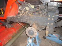 Kubota hydraulic block, left rear wheel removed.jpg