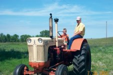 Calyb and papa on tractor 10 07-30-01.jpg