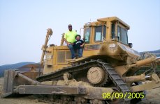 Hunter & Daddy on D-8 Dozer for Hunter's 5th Birthday.JPG