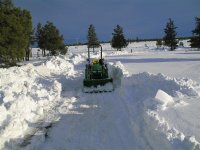 tractor cleaning driveway (Medium).jpg