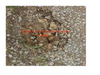 8-150233-dampothole.jpg