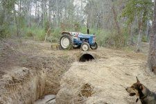 Tractor on culvert & Booger.JPG