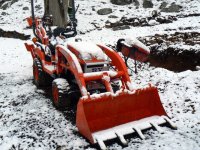 snow on tractor x.JPG