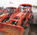 Kubota with bucket levels on bucket.jpg