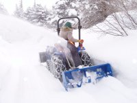 570916-New Holland TC24D in snow.jpg