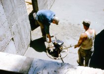 Dad Smoothing the patio concrete.jpg