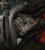 B2320 Alternator Adjustment Old Belt.jpg