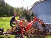 digging storm shelter with towable 003.JPG