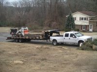 Loaded with logs and bobcat.jpg