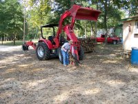 11-3-07 Greasing the Big Red Beast with Booger.jpg