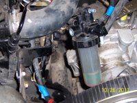 fuel filter removed for oil filter access.JPG