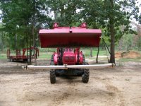 10-28-11 Big RED Beast slinging tin.jpg