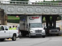 Truck stuck under a bridge.jpg
