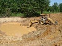 501816-Spring, digging with backhoe, Sep 04.jpg