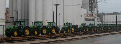 584882-Tractors on Flat Cars.jpg