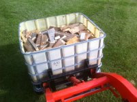 Lifting IBC of firewood.jpg