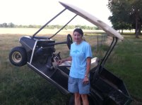 Golf Cart on Fence.JPG