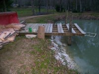 2-26-12 Sodium Bentonite Clay going under Pier.jpg