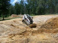 8-4-12 Bobcat Backing Up In Tilt.jpg