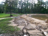 7-13-12  Pump Running on Eroded Dam.jpg