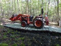 TractorOnRd1.JPG
