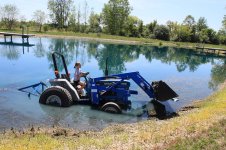 2 Granddaughter on tractor.jpg