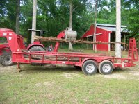 4-23-10 Unloading Cedar Logs.jpg