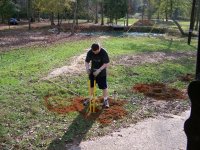 12-8-12 Luke Cleaning Out Post Holes.jpg