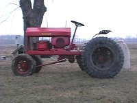 557079-Big tires side small.jpg