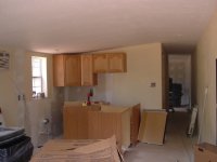 475027-Cabin, cabinets getting installed, Jul 04.jpg