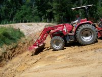 9-1-13 Mahindra Going Down Pond Slope.jpg