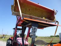 Kubota Frontsideside sitting canopy on ROPs.JPG