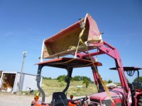 Kubota sitting canopy on ROPs.JPG