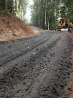 Laying gravel.jpg Laying gravel.jpg
