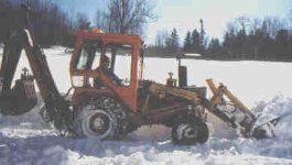 387161-backhoesnow1.jpg