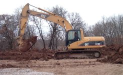 565601-Excavator cropped (665 x 408).jpg