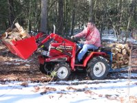 Yanmar Tractor Hauling Wood.jpg