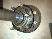 TO-30_left_rear_axle_looking_at_collar_and_bearing.jpg