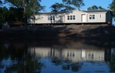 434809-home_on_pond_apart01cr_sm.jpg
