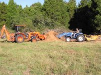 525881-miketractorspile.jpg