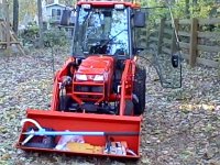 Kubota B3030 & Chain Saw in Bucket.jpg