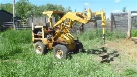 waldon with post hole digger.jpg