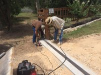 mikim gate 11 setting concrete anchors.jpg