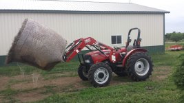 Farmall 55a and bale.jpg Farmall 55a and bale.jpg