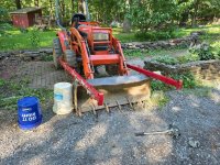 Tractor with fense stretchers.jpg