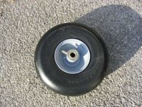 623825-New Mower Wheel.JPG