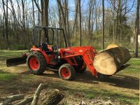 Tractor with log.jpg