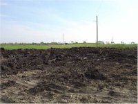 626125-DirtWorkDay1_2FtTopSoilPushedToSouthOfPadSmall.jpg